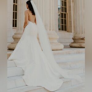 Elegant Ivory Wedding Dress by Enzoani